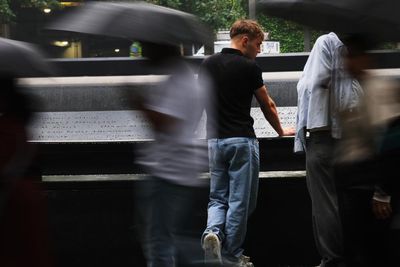 ‘I feel the pain of all those souls’: Ground Zero visitors remember lives lost on 9/11