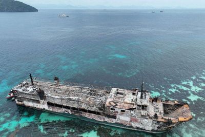 Rescuers finally able to board charred Philippines ferry 40 hours after fire broke out