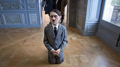 Hitler, horses and pigeons: Maurizio Cattelan explores power and darkness in Berlin exhibition