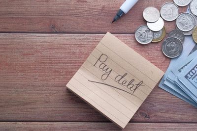You Have $30,000 in Savings and $15,000 in Debt. What Should You Do With the Money?