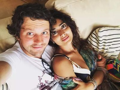 Ajay Devgn's Drishyam co-star Shriya Saran lives with Andrei Koscheev in a Mumbai home with Buddha statue in entrance, peacock feather walls, red patterned boundary wall and tribal art