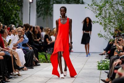 Michael Kors revives 2010s business casual with cropped blazers and high-low hems at NYFW