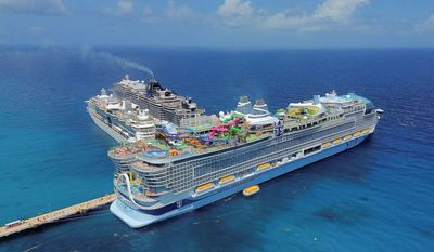 Royal Caribbean cancels Alaska cruise after 1,700 passengers board ship in Vancouver and are left waiting; guests told to leave by midnight