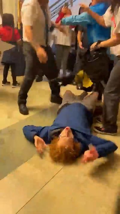 Moment protester 'thrown to the ground' by Hackney Council security officer
