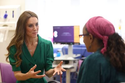 Watch: Kate surprises patients on return to cancer hospital to thank staff