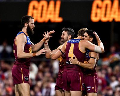 Lions rewarded for embracing risk as ‘good Brisbane’ keep AFL flag dream alive
