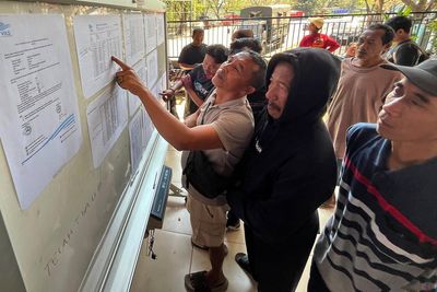 Indonesia searches for 129 people missing after ferry capsizes