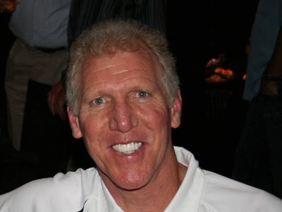 NBA legend Bill Walton redesigned his San Diego home’s roofs for solar and installed tanks holding 32,000 gallons of rainwater; his family worked on the garden for 45 years