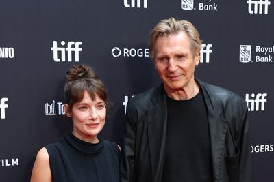 Liam Neeson sparks dating speculation after holding hands with co-star on the red carpet