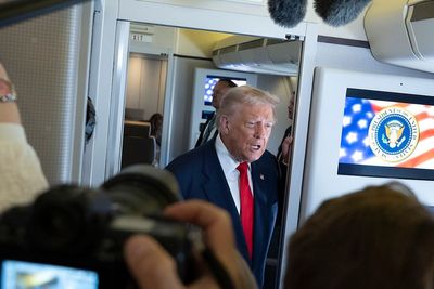 Trump Plays 'Approved Rally Playlist' for Reporters on Air Force One Featuring Dolly and WWE Theme