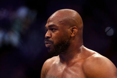 Jon Jones taunts Tom Aspinall as old rival gives up UFC title