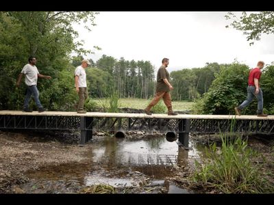 MIT researchers are giving millions of plastic bottles a new life by turning plastic waste into homes, decks and bridges using AI robots
