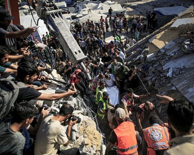 At least 21 killed after Israeli-hit building in Gaza City collapses