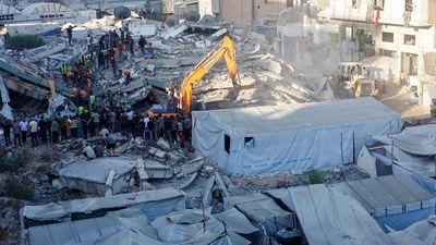 20 dead, dozens missing after war-damaged apartment block collapses in Gaza