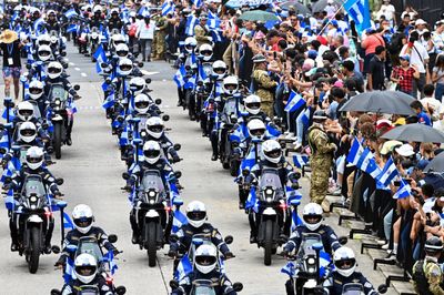 Robot Dogs, U.S. Praise and a March for Detainees: How El Salvador's 205th Independence Day Unfolded