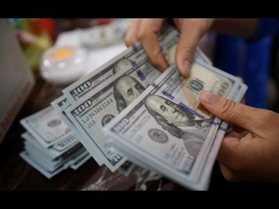 Dollar rises after Fed hikes rates in bid to counter inflation