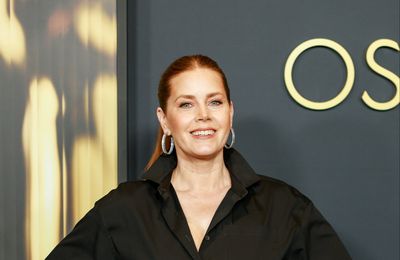 Amy Adams has to 'isolate' on set to keep 'golden retriever' personality at bay