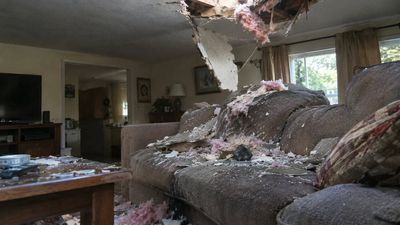 Meteorite Crash Through Roof: family turns space rock into museum star; scientists probe its secrets