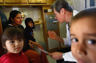 New Public Charge Rule Takes Effect Friday, Letting Immigration Officers Weigh Medicaid as 22 States Sue