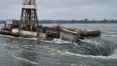 Lake Drains Into Mine: Texaco rig triggers whirlpool; landscape transformed