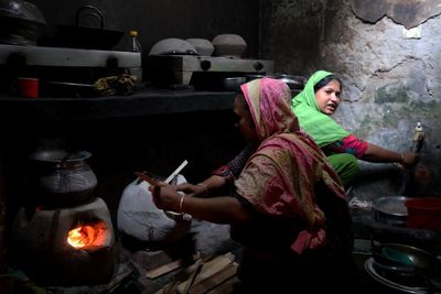 ‘I spend a bagful of money and don’t fill a bag’: the energy crisis hits Bangladesh