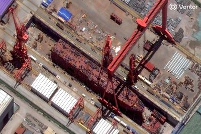 What is China building this giant ship for? Satellite images offer a clue