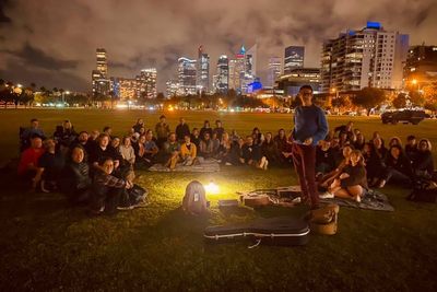 Belle and Sebastian play spontaneous gig in local park after Perth concert cancelled