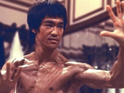 Quote of the day by Bruce Lee: 'Take things as they are. Punch when you have to punch. Kick when you have to kick.' Life lessons from inspirational quote on reality, truth, overthinking, acceptance, decisive purpose, emotional resistance and simplicity