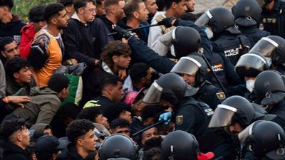 Spain launches operation to clear Ceuta beaches as nearly 10,000 migrants remain