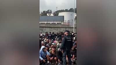 Video shows migrants running towards temporary camp in Ceuta