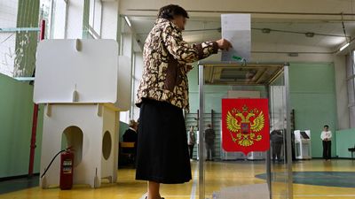 Russia reports cyberattacks as parliamentary vote enters second day