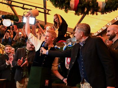 Munich's Oktoberfest roars to life as mayor taps first keg