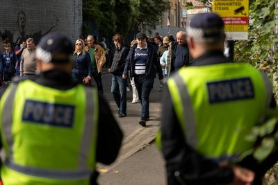 In pictures: Millwall and West Ham fans watch derby amid tight police presence