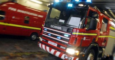 Crews tackle building on fire as major road closed in Scottish city