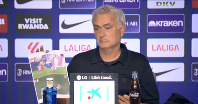 Watch: Jose Mourinho calls out referees with printed photos of missed fouls in wild press conference