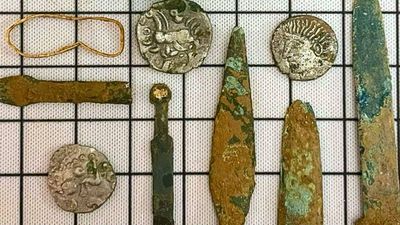 Archaeologists uncover Celtic sacred site near Cirencester with coins, shields and spears
