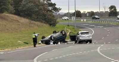 Allegedly stolen car flips in serious highway crash
