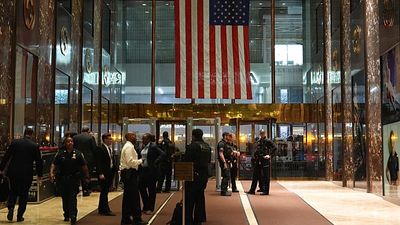 Macron walks through busy New York streets to Trump Tower