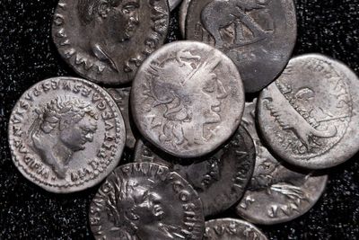 Amateur archaeologist unearths huge Roman silver coin treasure trove in Germany