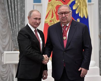 EU removes two oligarchs from Russia sanctions list as deadline looms