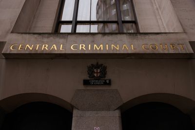 Woman accused of fatally stabbing City banker partner exchanged intimate messages with another man, court told
