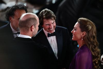 Tom Cruise is the perfect gentleman as he greets Prince and Princess of Wales at Digger premiere in London
