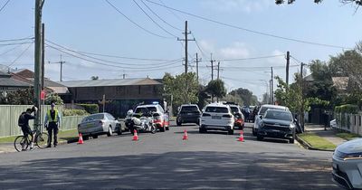 Police swarm street, driver arrested after crashing into parked car