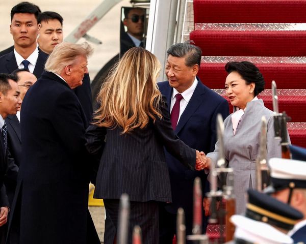 Trump greets Xi Jinping on arrival in rare move as US-China trade truce extended