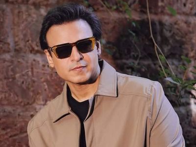 Vivek Oberoi's Rs 14 crore Juhu Bungalow in Mumbai features Goan farmhouse aesthetic with antique furniture, lush greenery, a generations-old family bed and even a pet cow named Kamadhenu