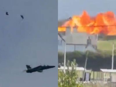 Watch: RAF T2 Hawk jet crashes and bursts into flames in North Wales after two pilots eject mid-air; video goes viral