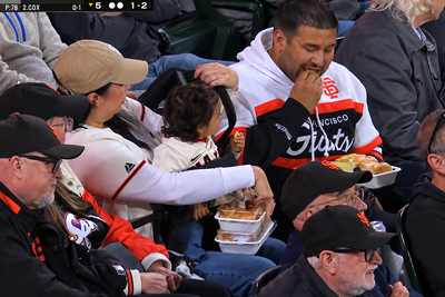 Giants Announcers Roast Man Eating as Mum Juggles Baby and Food During Baseball Game