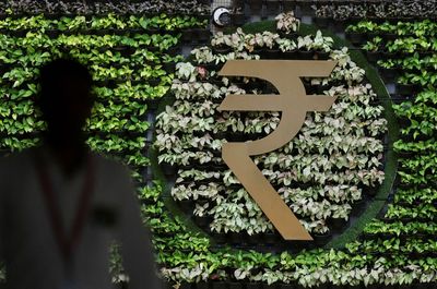 Rupee declines to one-week low as oil rally fans global rate hike worries