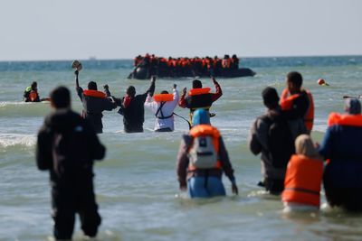 Far-right UK activist arrested after migrant dinghy slashed in the English Channel
