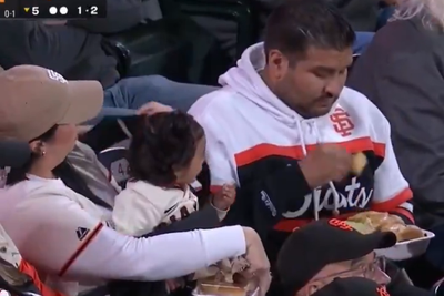 Giants Fan Dad Branded 'Useless' as Wife Carries Baby and Three Plates of Food While He Does Nothing